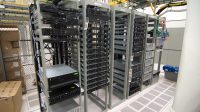 A cloud service data center interior with servers and racks.